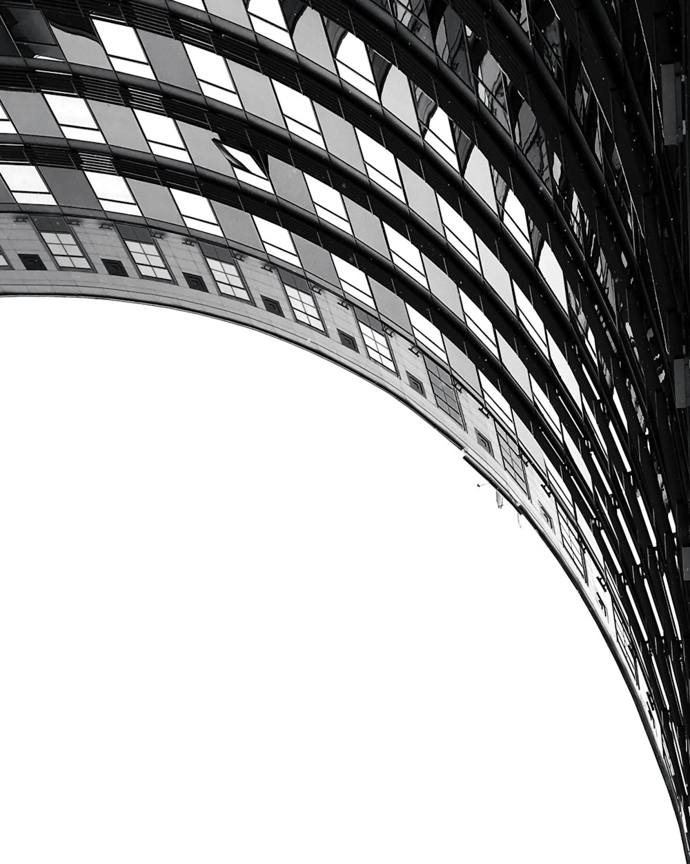 a black and white photo of a metal structure