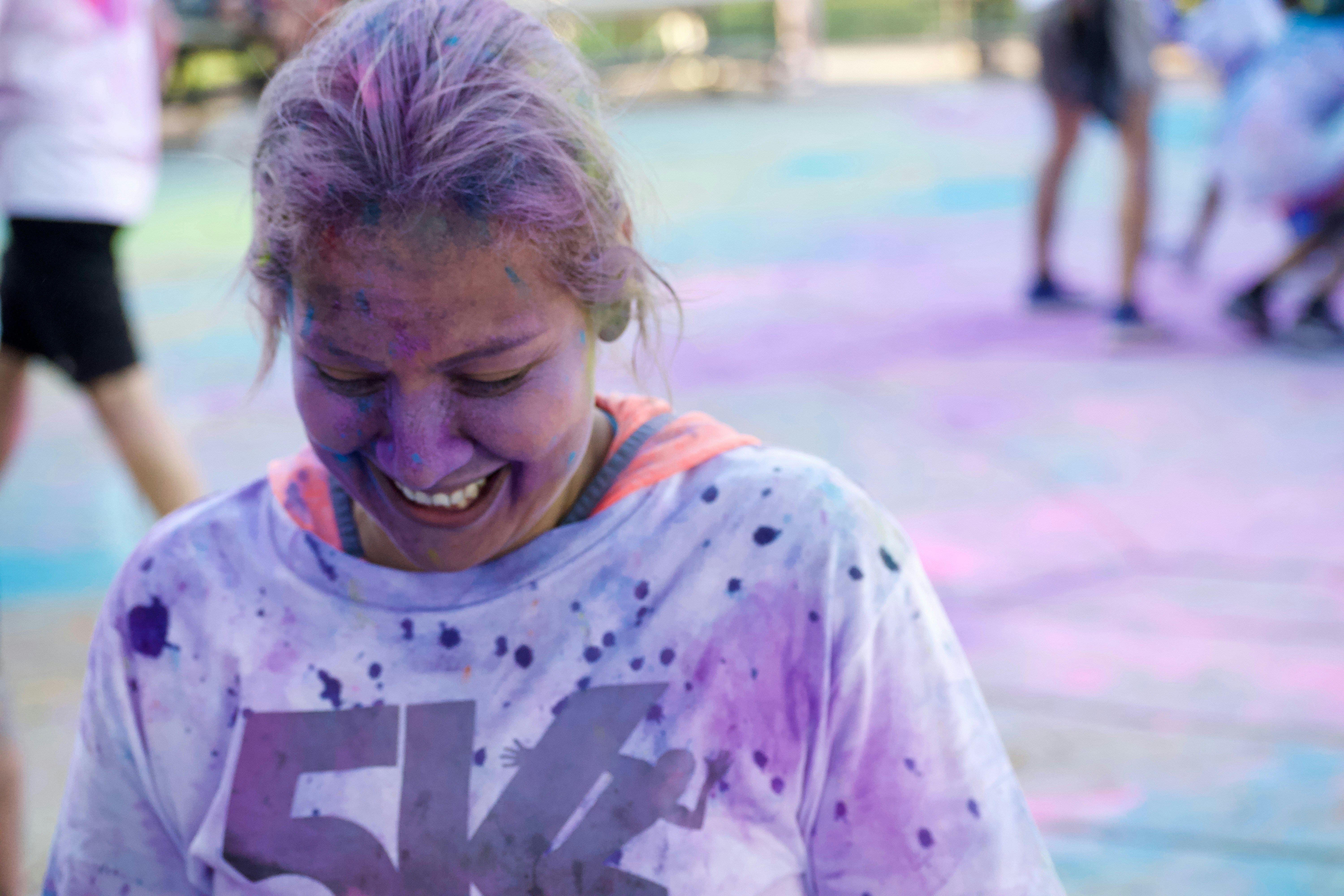 Young woman laughing at outdoor party event