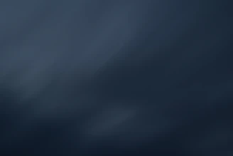 Abstract neural network pattern with subtle gradient in dark theme.