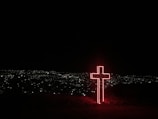 red neon light cross signage