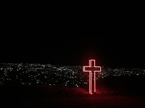 red neon light cross signage