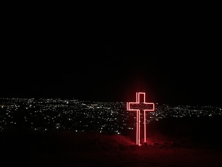 red neon light cross signage