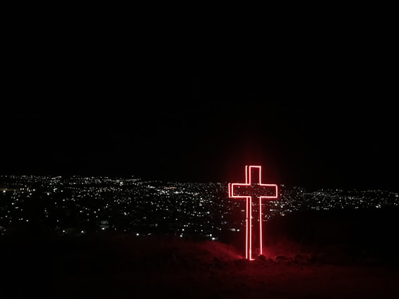 red neon light cross signage