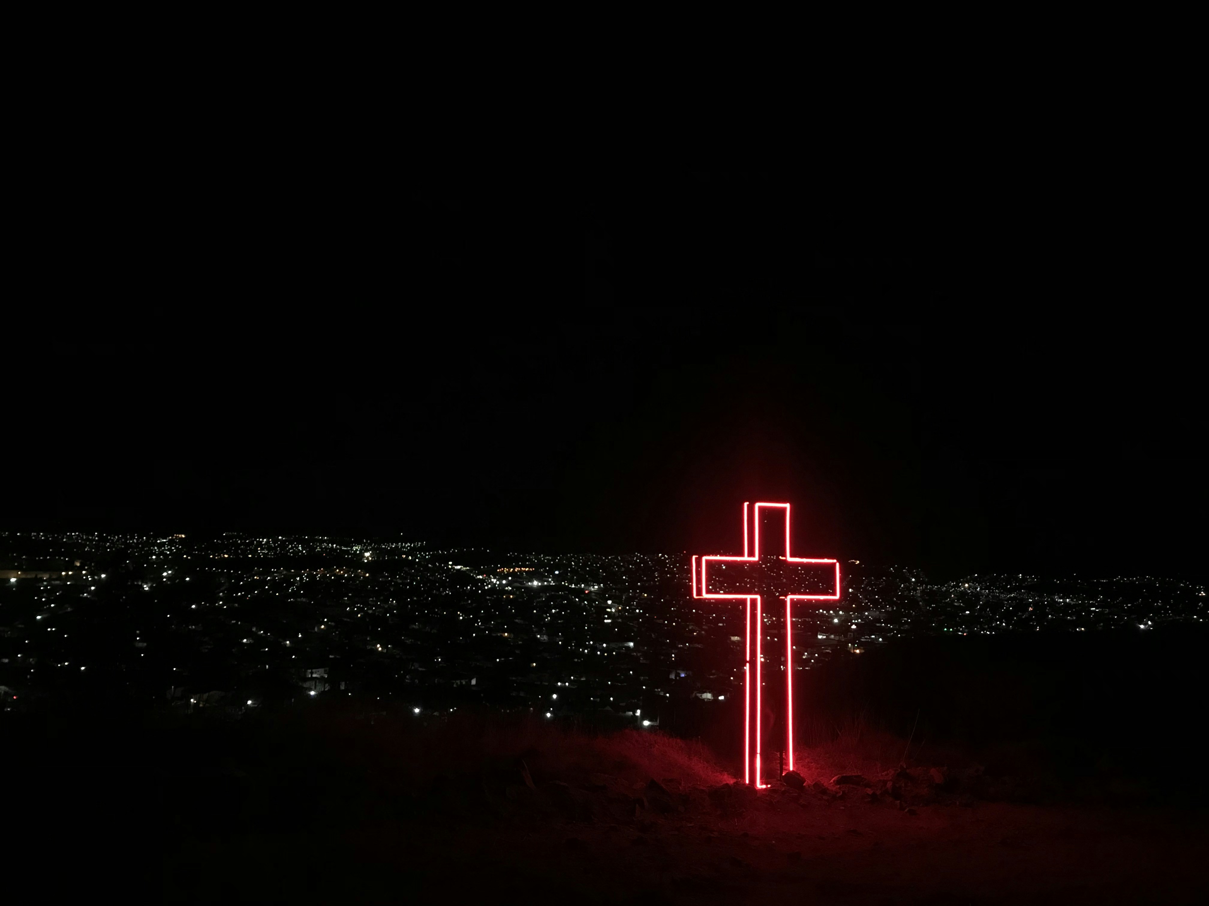 red neon light cross signage