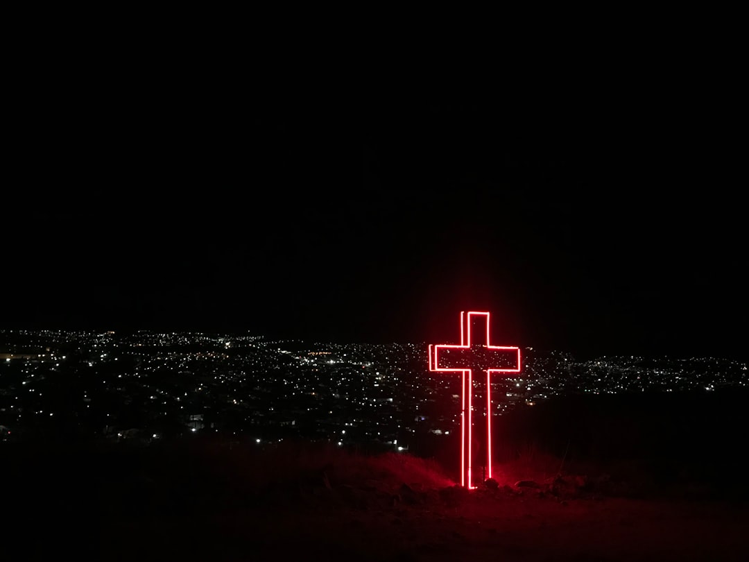 red neon light cross signage