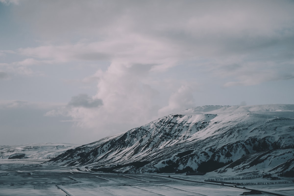Kópavogur Iceland suburbs — misty snow-covered landscape of Iceland's outer residential municipalities in winter
