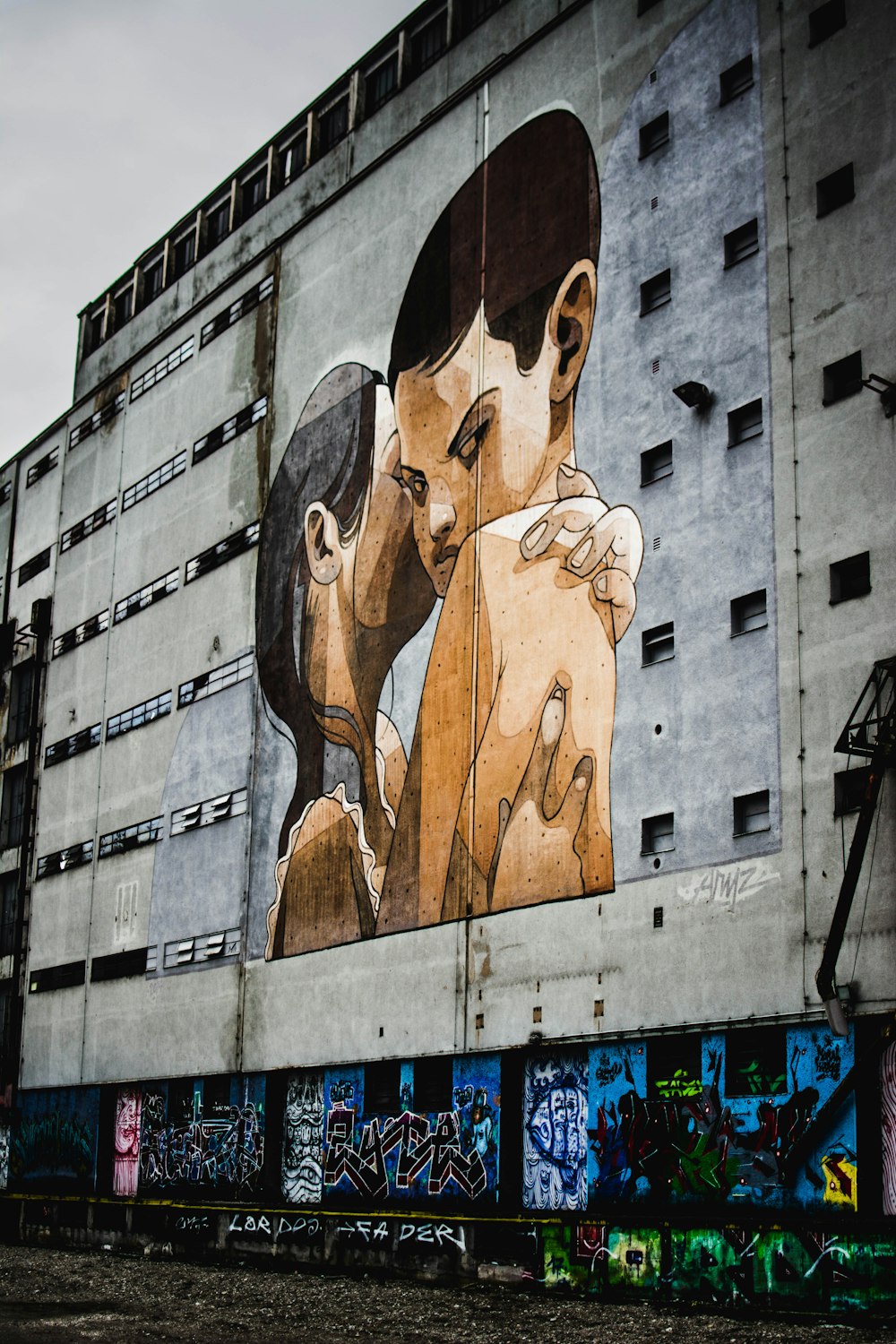 woman kissed the cheek of boy graffiti