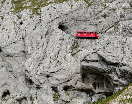 red bus during daytime photo in Mount Pilatus Switzerland