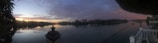 A panoramic view of the serene Ganges River in Rishikesh.