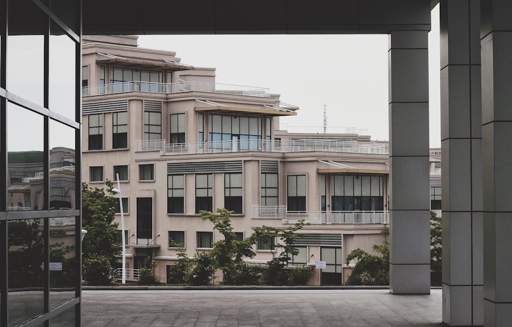 white concrete building near road