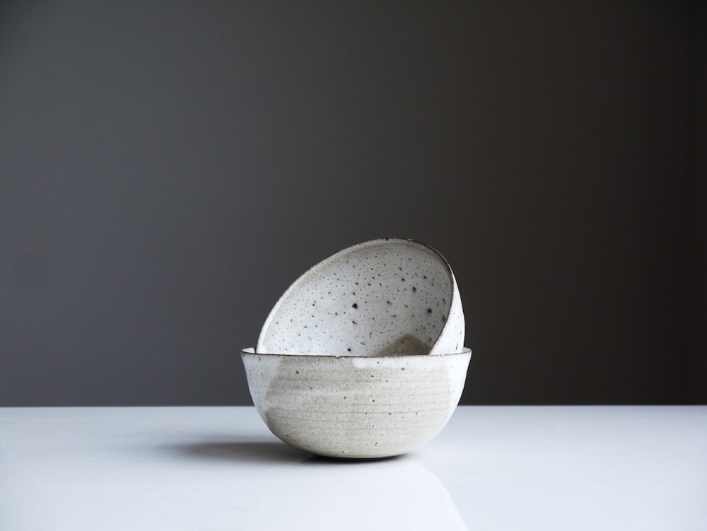 two white ceramic bowls