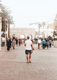 group of people walking on street during daytime