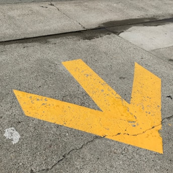 yellow road sign, time to pave makring