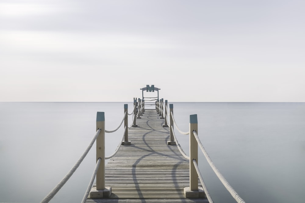 wooden dock on body of water