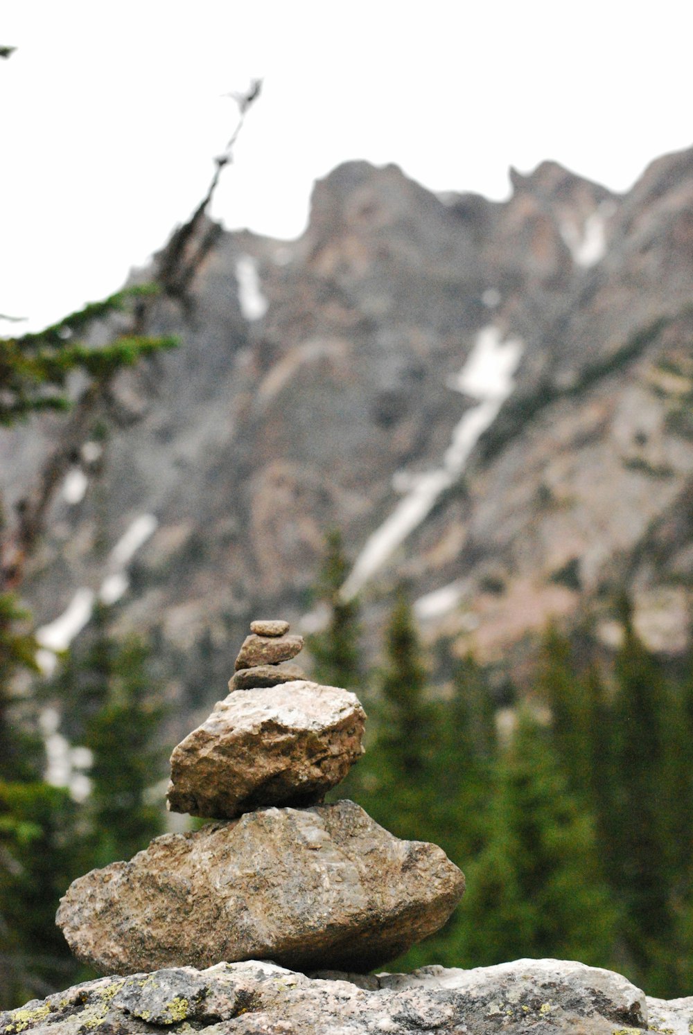 five stone formation near mountain