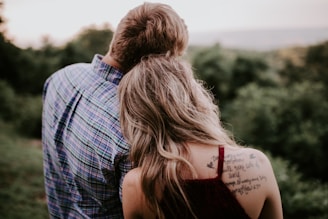 couple standing on mountain