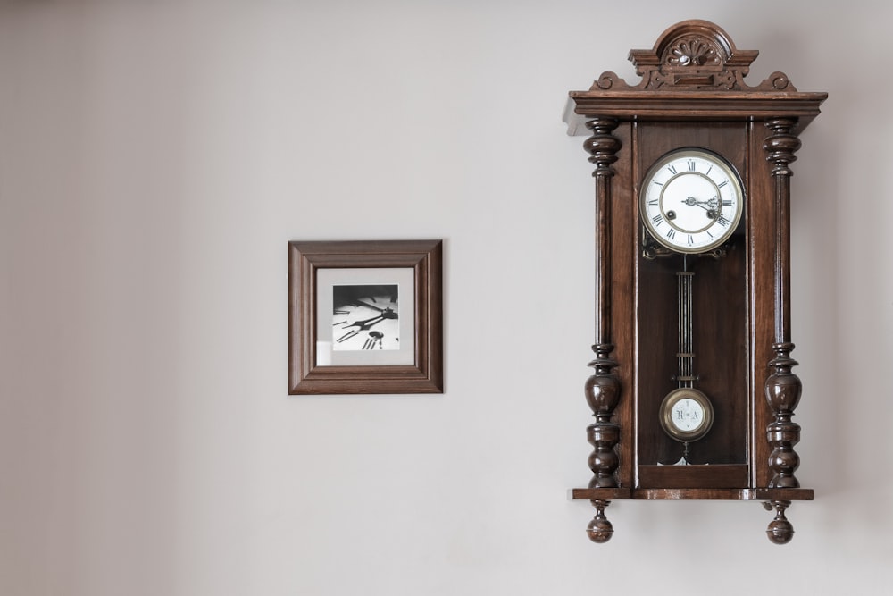brown pendulum clock