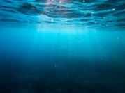 clear blue body of water