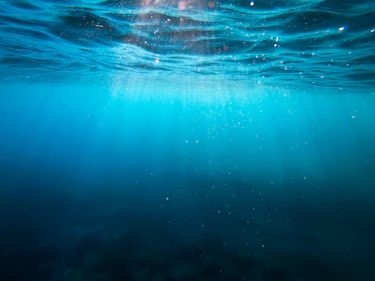 clear blue body of water