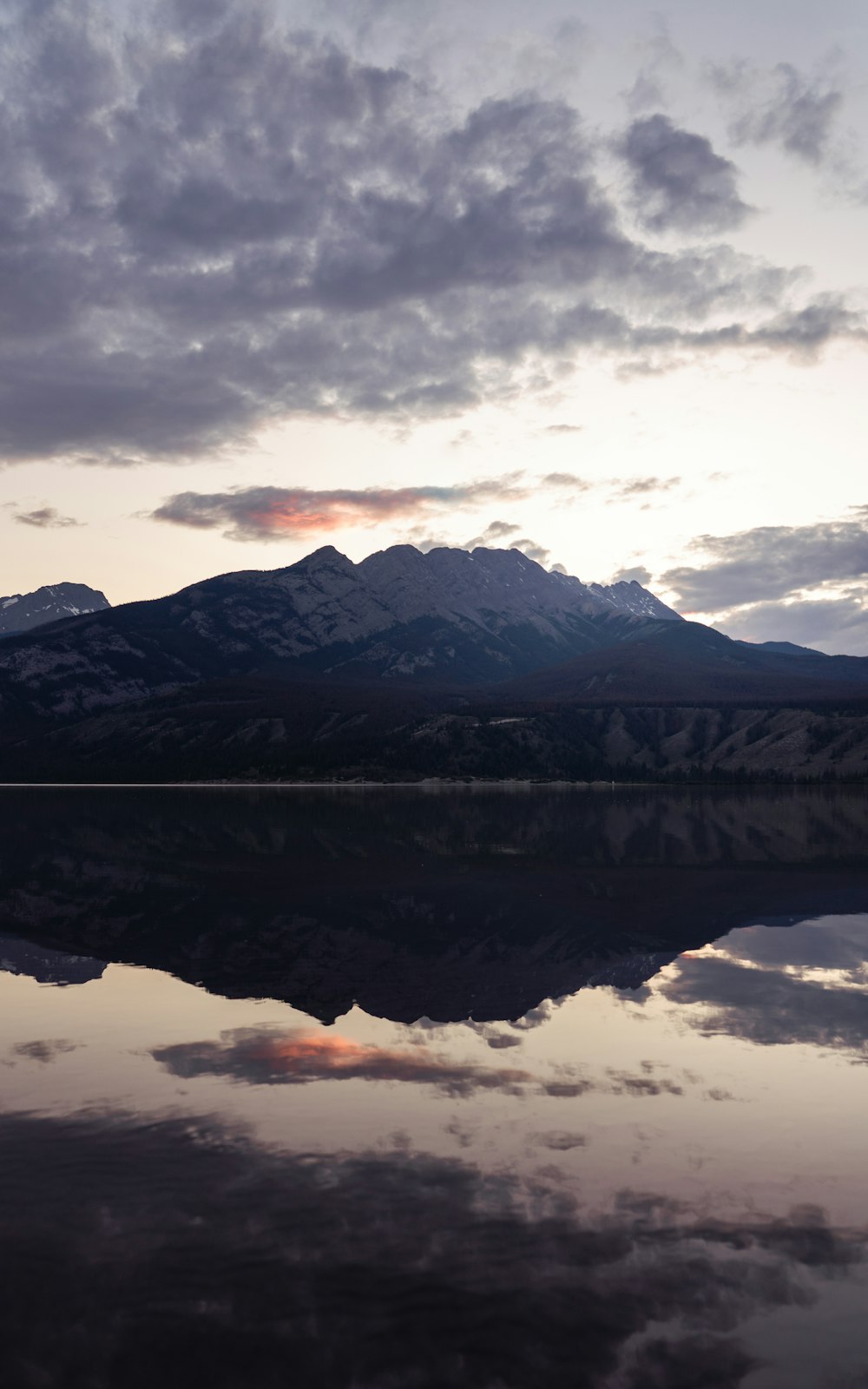 body of water near mountain