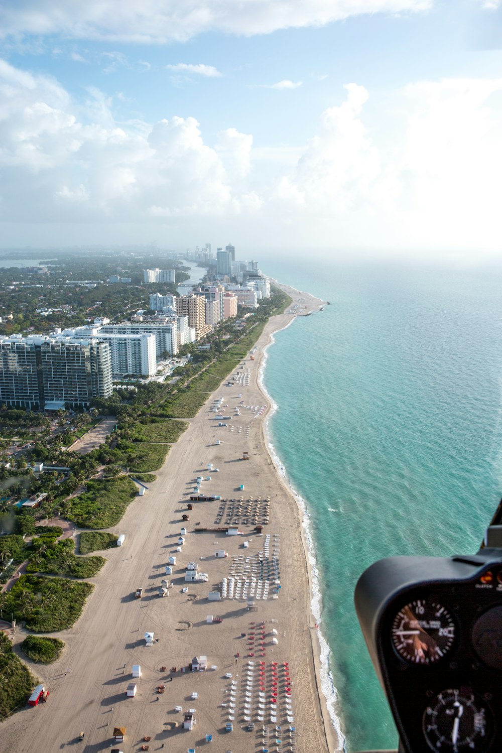 aerial photograph of seashore and buildings