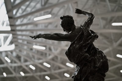 A vibrant bronze sculpture capturing dynamic movement.