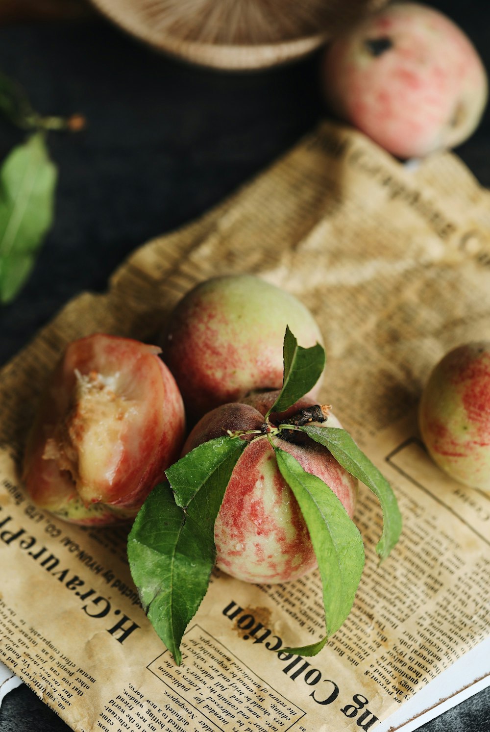 peach fruit on newspaper