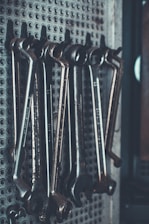 close-up photo of gray combination wrench set