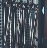 close-up photo of gray combination wrench set