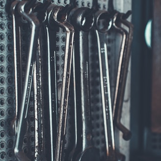 close-up photo of gray combination wrench set