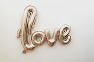 gold love balloon