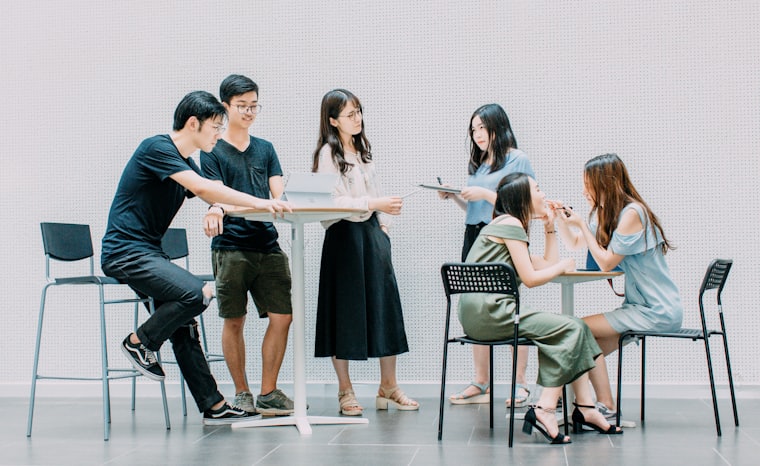 Corporate consulting professionals in discussion