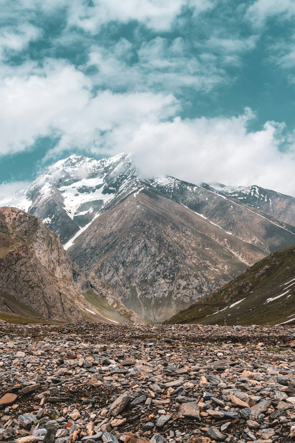 snowy mountain under white sky