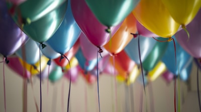 selective focus photography of assorted-color balloons