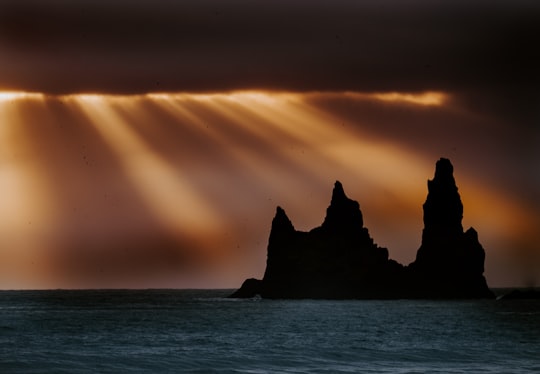 rock formation silhouette during golden hour in Reynisdrangar Iceland