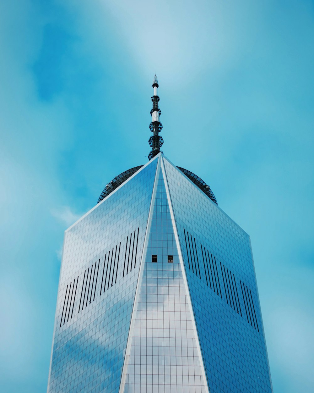 low angle photography of mirror high-rise building