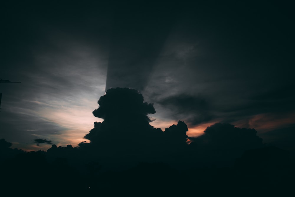 silhouette of clouds during sunset