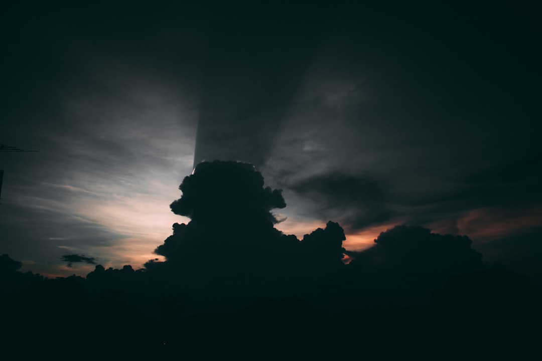 silhouette of clouds during sunset