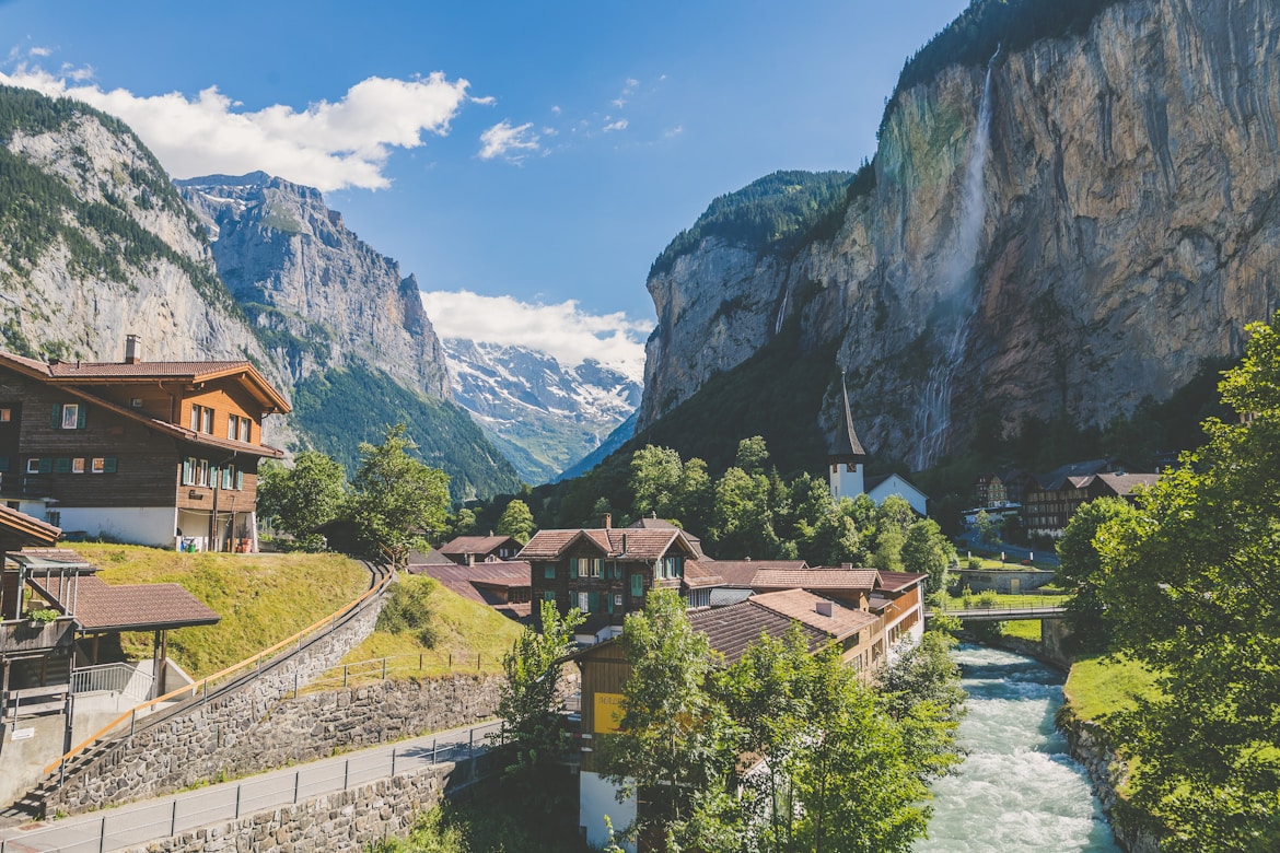 houses near valley with trees