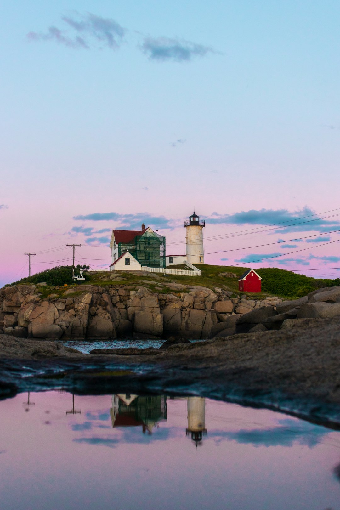 house beside lighthouse