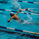 person swimming on marathon