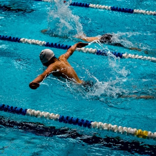 person swimming on marathon