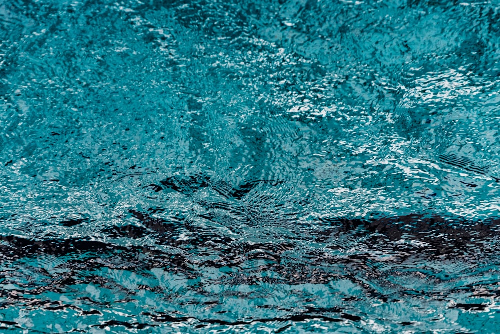 a close up of a blue water surface