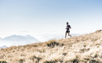 man running on the mountain