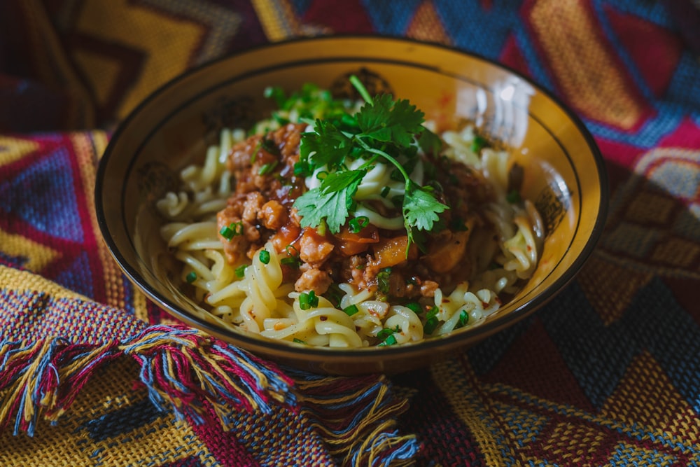 noodles with red sauce and parsley