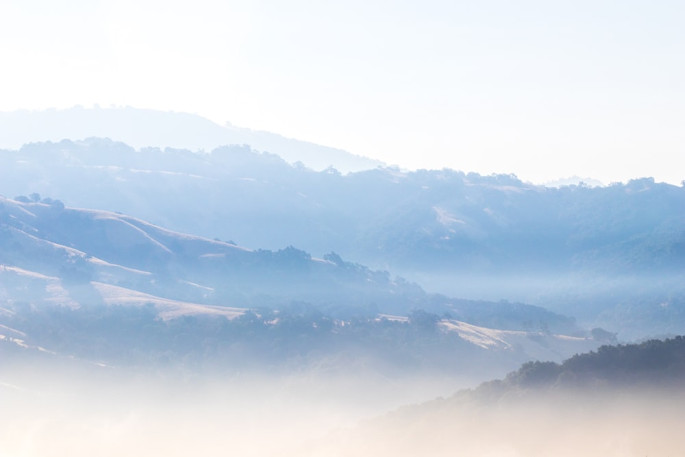 aerial photography of mountain during misty day