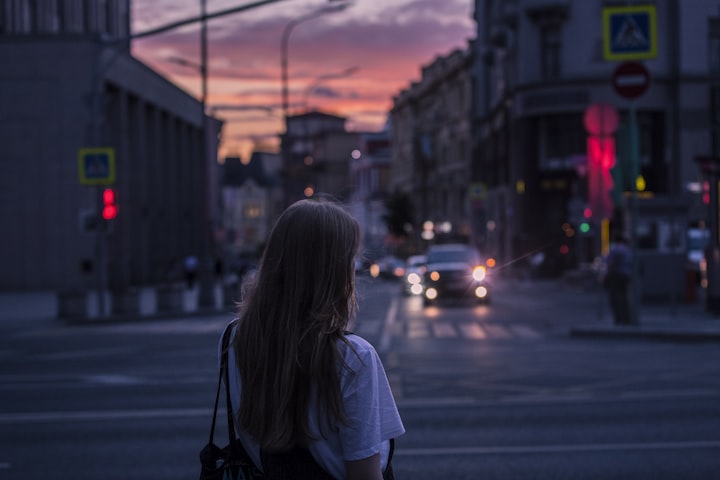 The lady on the sidewalk 