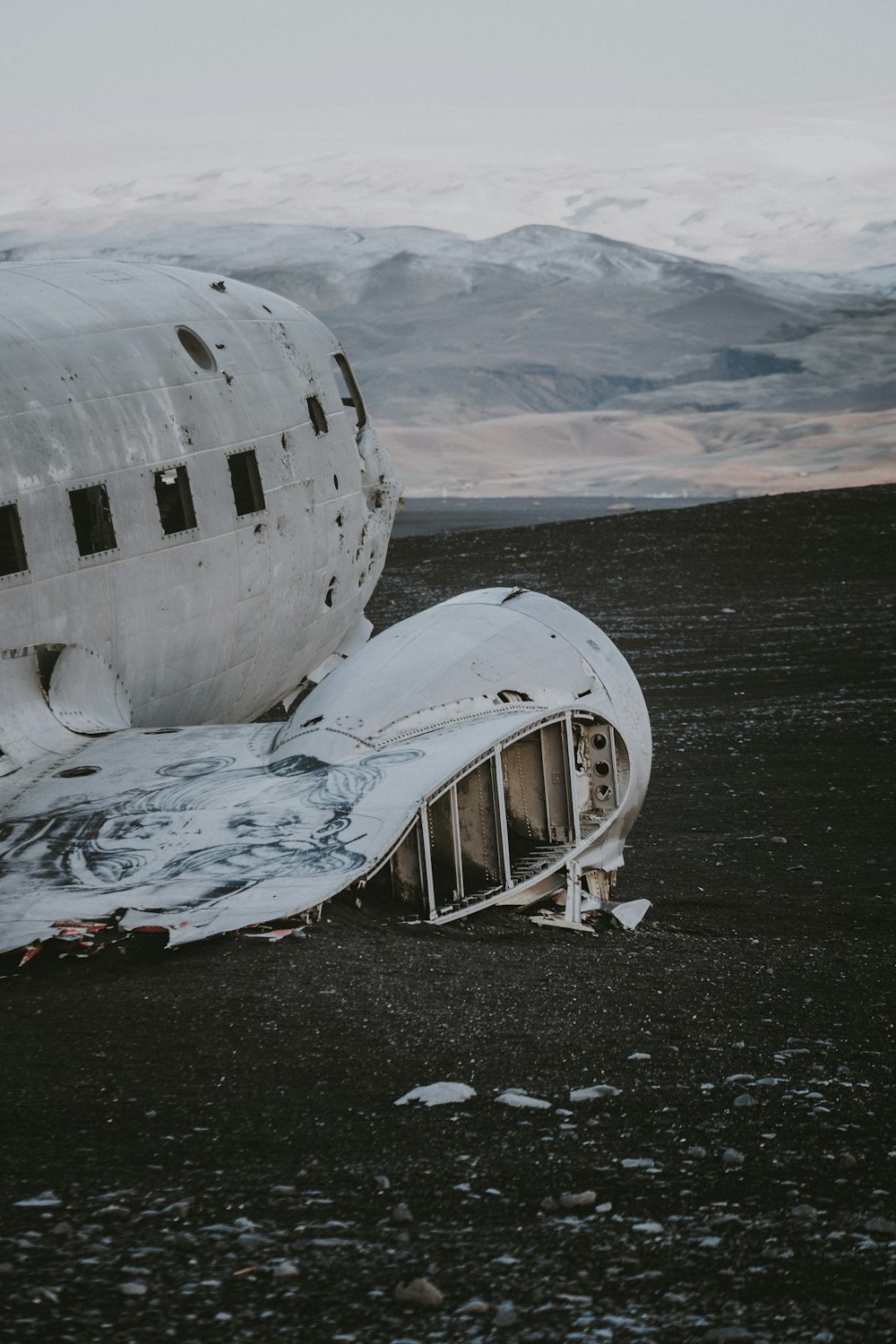 a plane that is sitting in the dirt