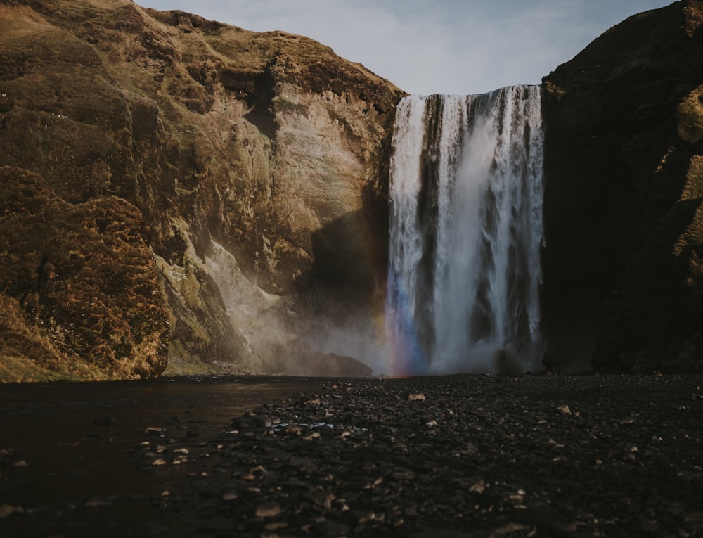 brown waterfalls at daytime