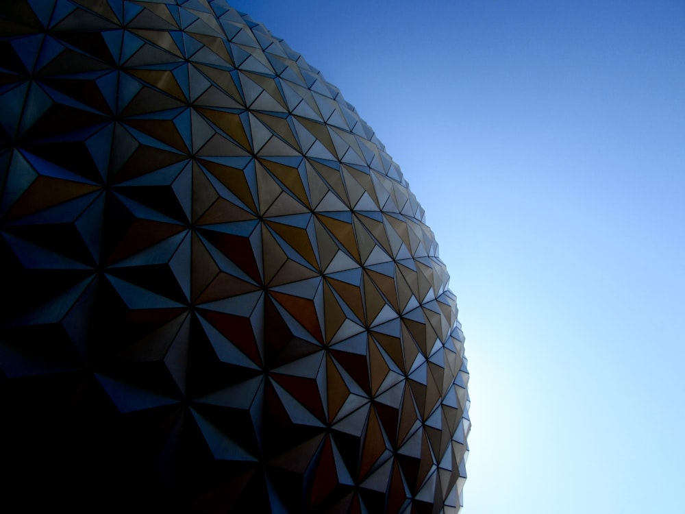 low-angle photography of state of the art building under blue calm sky